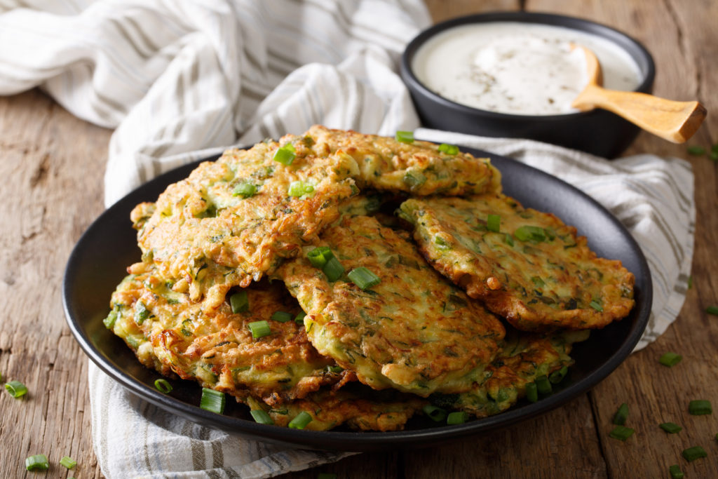 Mediterranean Zucchini Fritters With Tzatziki Sauce & Seasoned Carrots