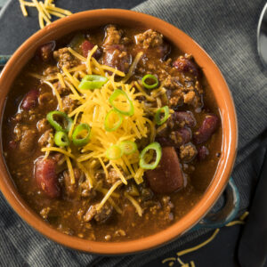 chili over cauliflower and root vegetables