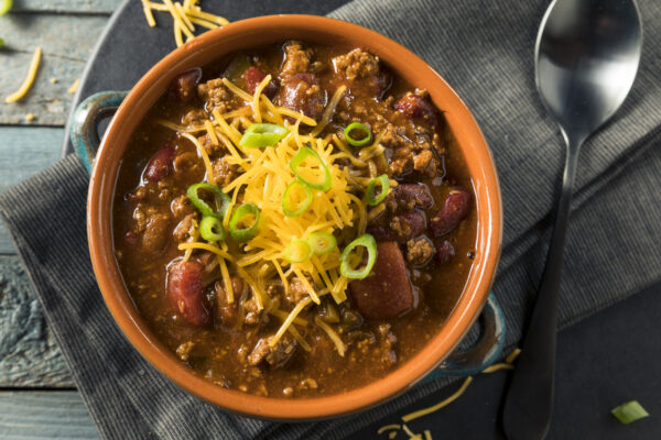 chili over cauliflower and root vegetables