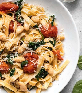 tuscan kale and white beans over pasta